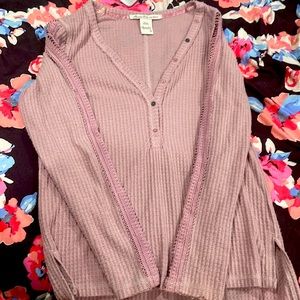 Runs big I would say it’s like a size medium even though it’s a small